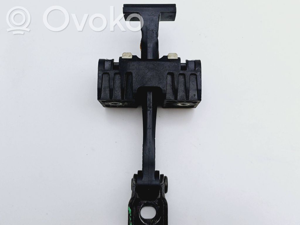 Front door check strap stopper   7070333
