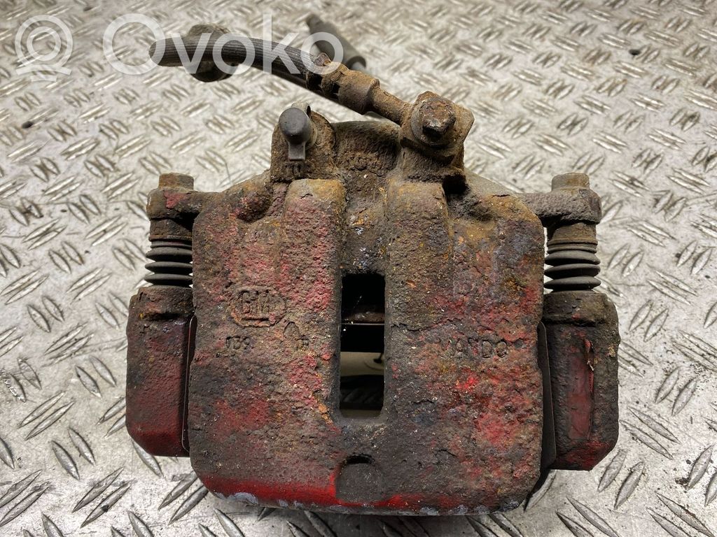 Opel Insignia A Zacisk hamulcowy przedni 