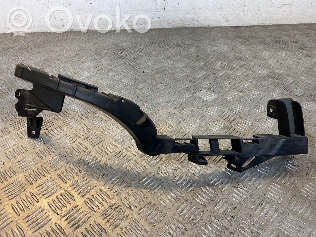 Opel Zafira C Uchwyt / Mocowanie lampy przedniej 