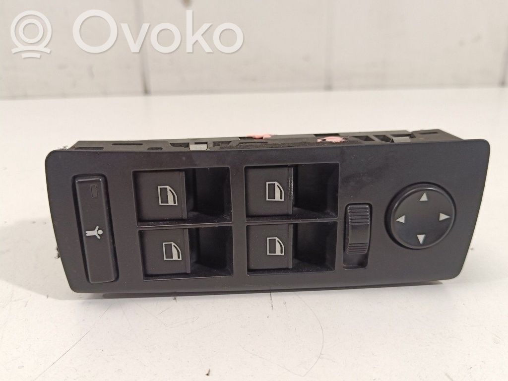 Electric window control switch   6907499