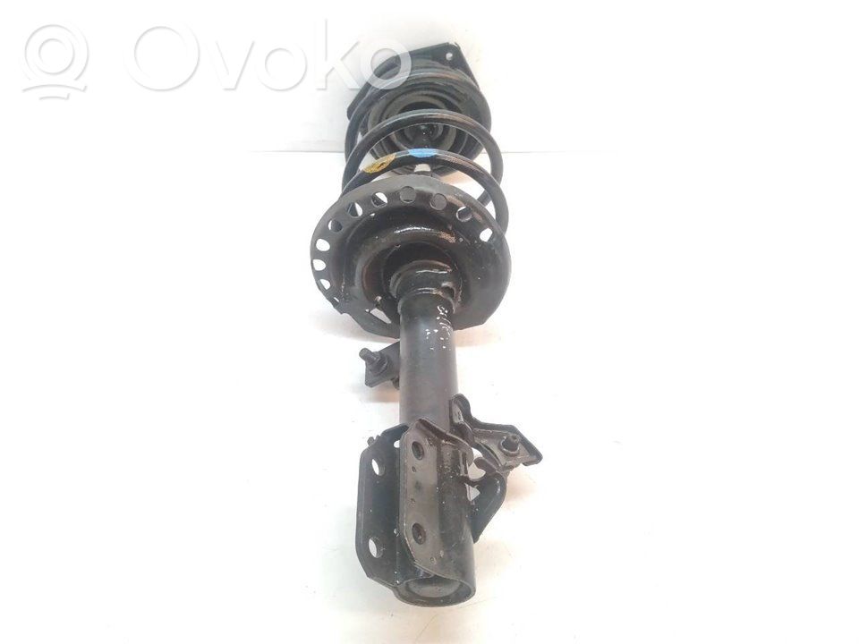 Front shock absorber with coil spring