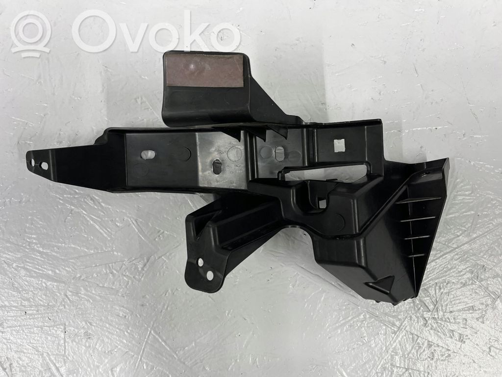 Mazda 3 Uchwyt / Mocowanie zderzaka tylnego 