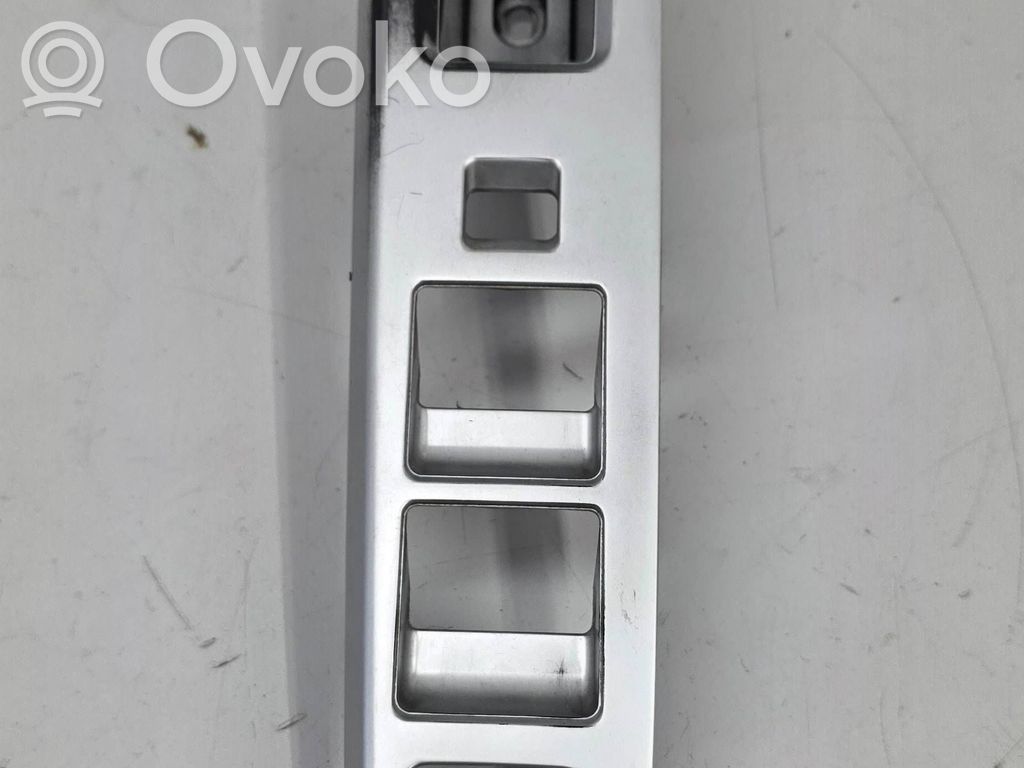 Mazda 5 Front door window switch trim 