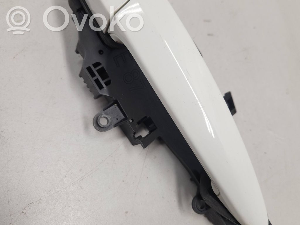 Manecilla externa puerta delantera   7059667,BMJ5121,860225,52621810