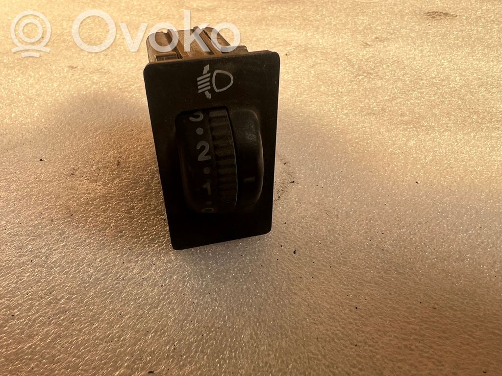 Headlight level height control switch