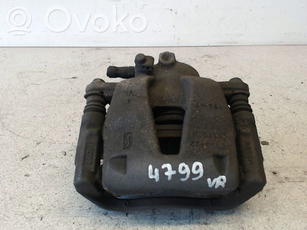 Opel Corsa D Zacisk hamulcowy przedni 