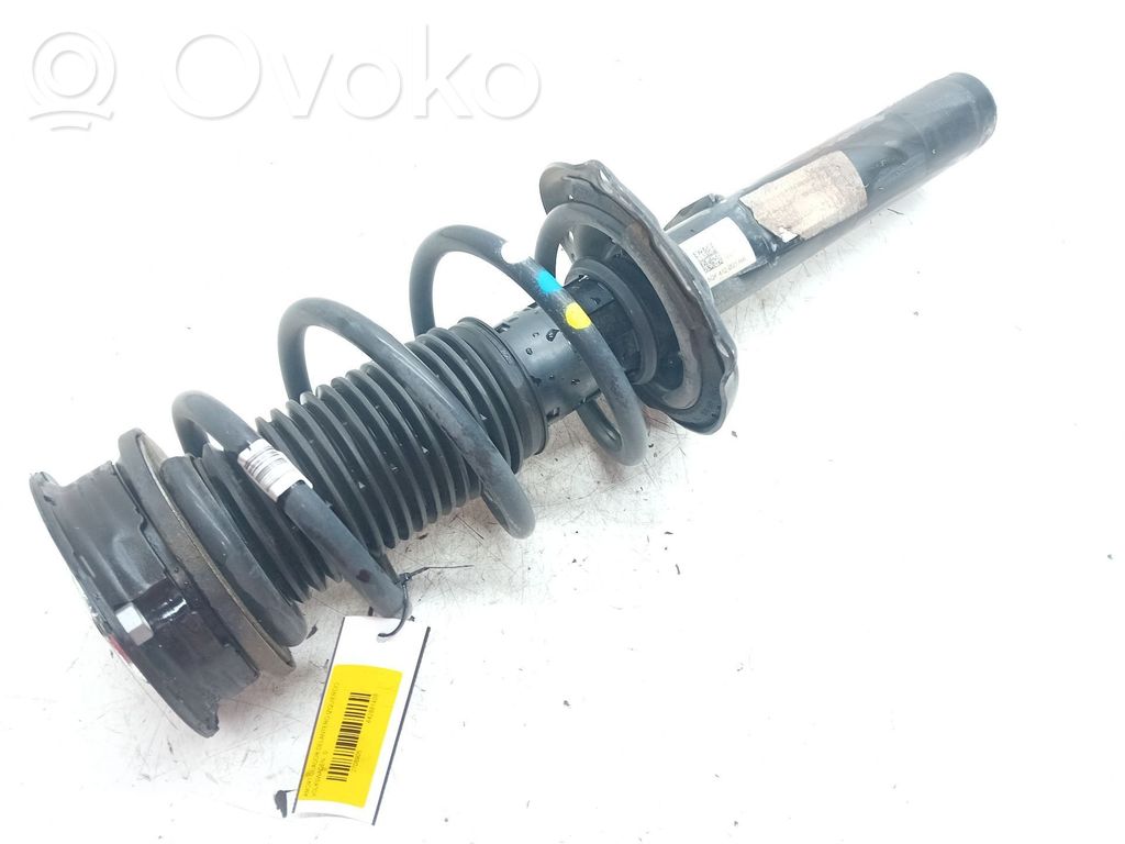 Volkswagen Tiguan Amortyzator osi przedniej ze sprężyną 