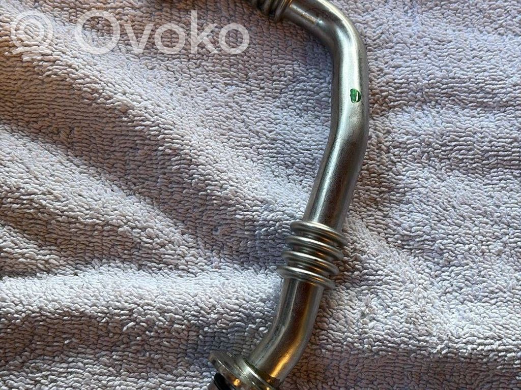 Volkswagen Golf VII Manguera/tubo de aceite del turbocompresor turbo 