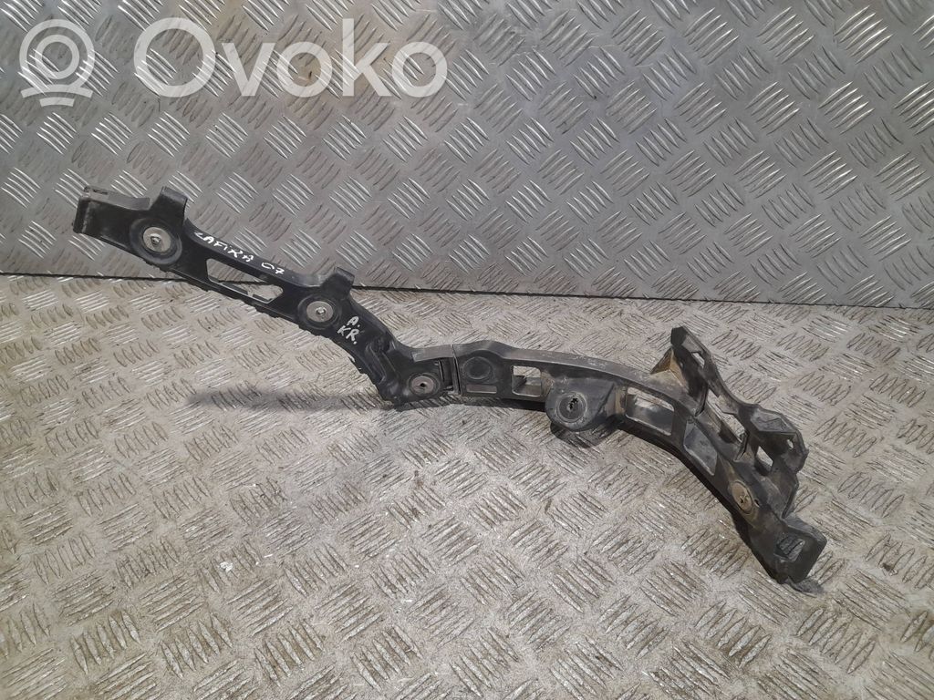 Opel Zafira B Uchwyt / Mocowanie zderzaka tylnego 