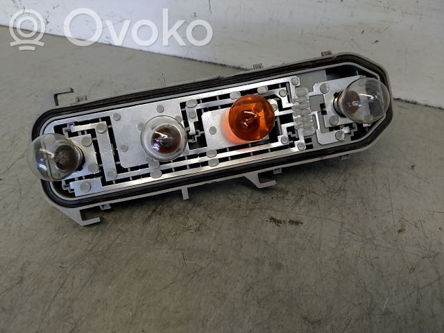 Renault Clio II Takavalon polttimon suojan pidike 