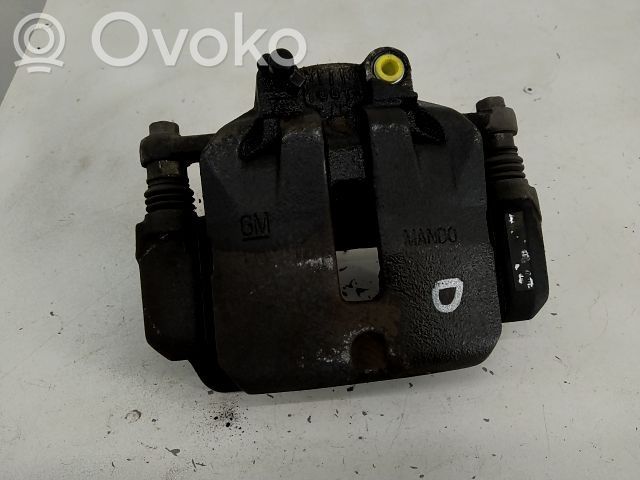 Opel Insignia A Zacisk hamulcowy przedni 