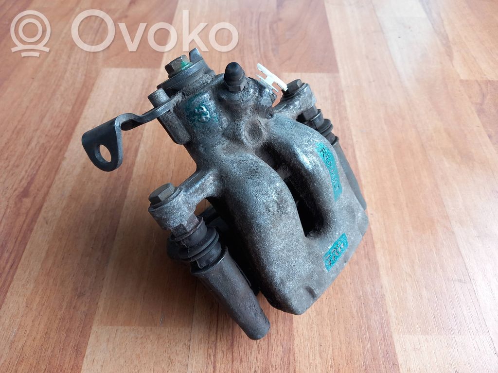 Renault Clio III Tylny zacisk hamulcowy 