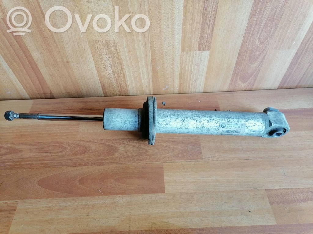 BMW 7 E65 E66 Aizmugurē amortizators 