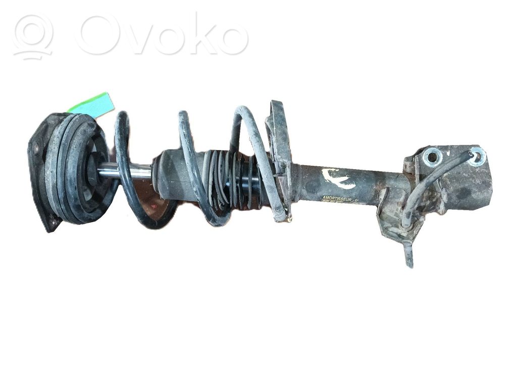 Nissan Note (E11) Amortiguador delantero con muelle espiral 