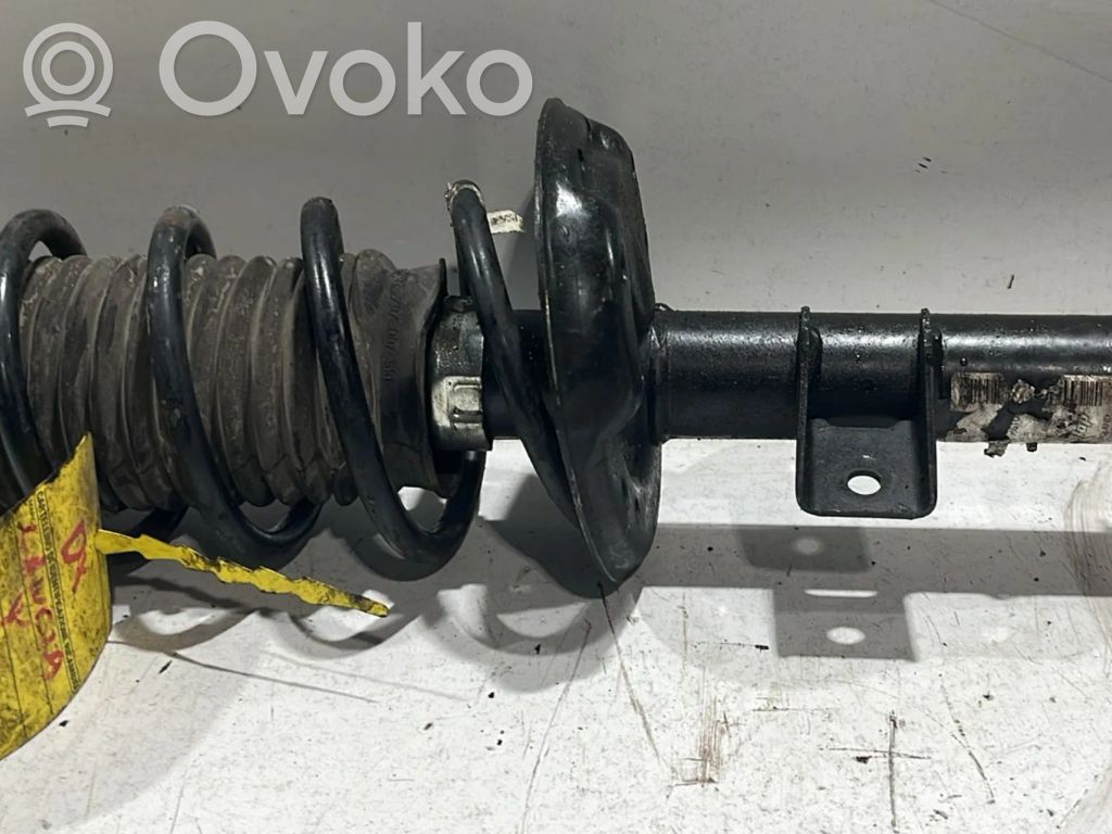 Front shock absorber with coil spring