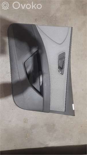 Front door card panel trim
