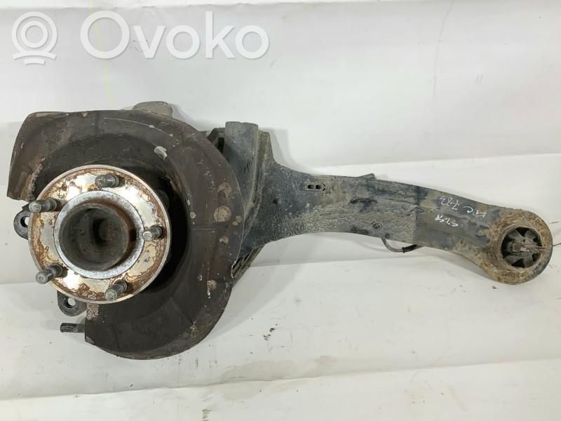 Ford Focus Передний поворотный кулак (ступица, цапфа) 