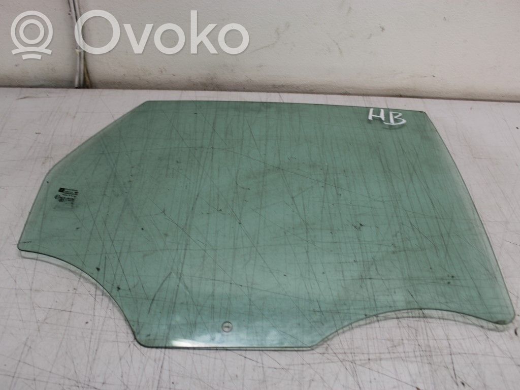Opel Astra J Szyba drzwi tylnych 