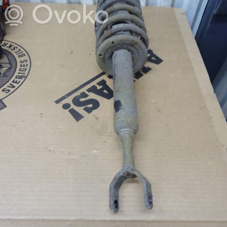 Amortyzator osi przedniej ze sprężyną   3B0413031AB,160333