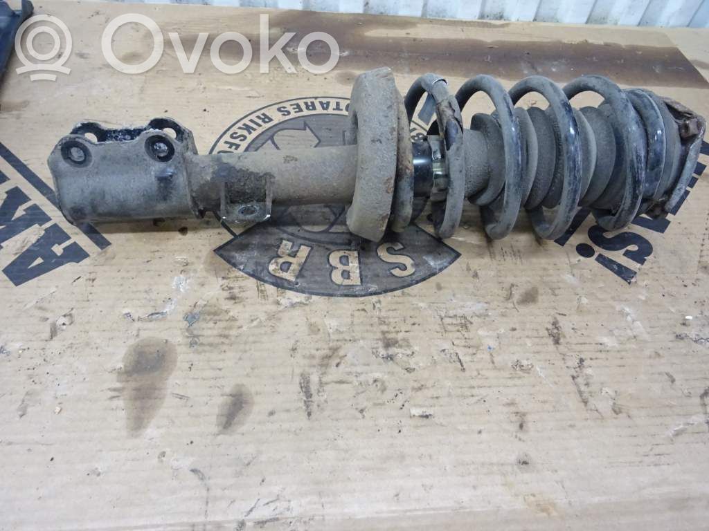 Saab 9-5 Amortyzator osi przedniej ze sprężyną 