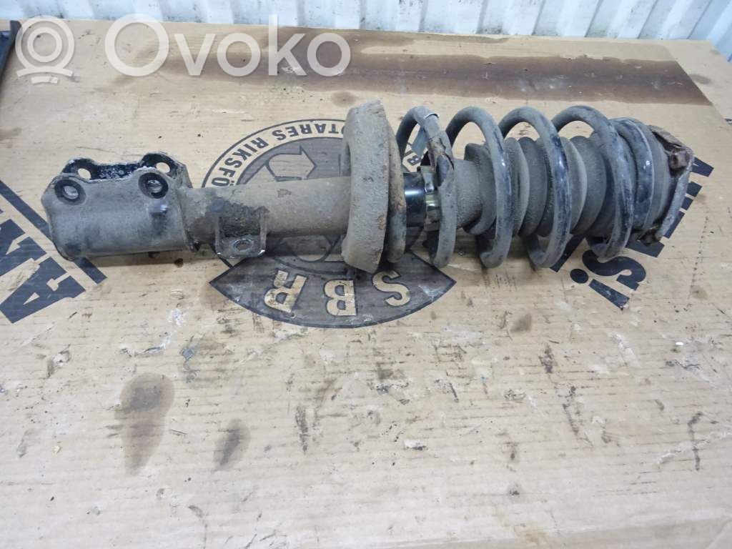 Saab 9-5 Amortyzator osi przedniej ze sprężyną 