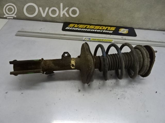 Toyota Corolla E120 E130 Priekinis amortizatorius su spyruokle 