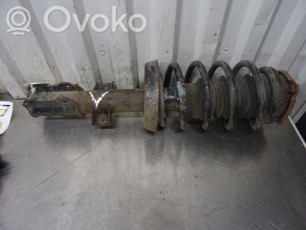 Saab 9-5 Amortyzator osi przedniej ze sprężyną 