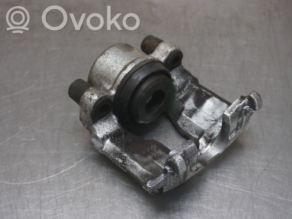 Opel Astra G Zacisk hamulcowy przedni 