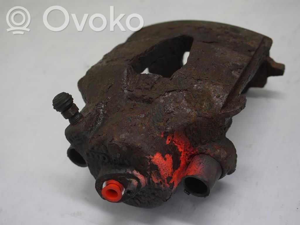 Skoda Octavia Mk2 (1Z) Zacisk hamulcowy przedni 
