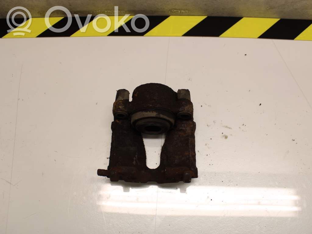 Opel Astra G Zacisk hamulcowy przedni 