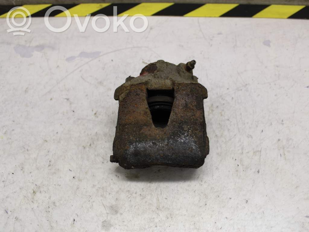 Skoda Fabia Mk2 (5J) Zacisk hamulcowy przedni 