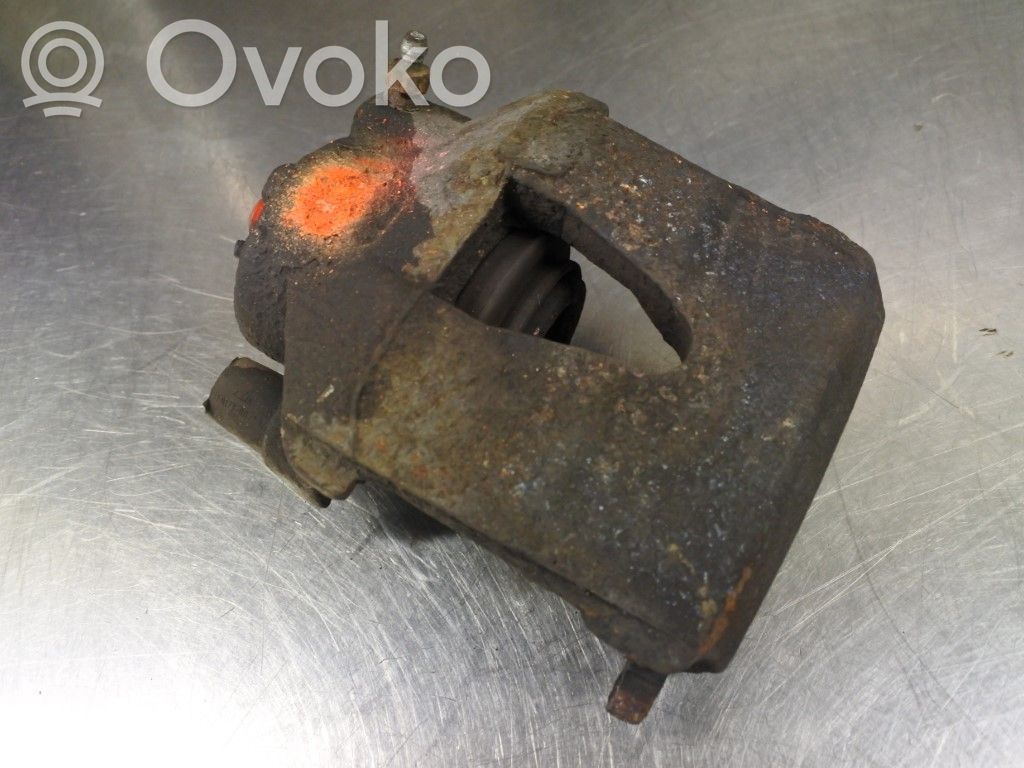 Volkswagen Polo IV 9N3 Zacisk hamulcowy przedni 
