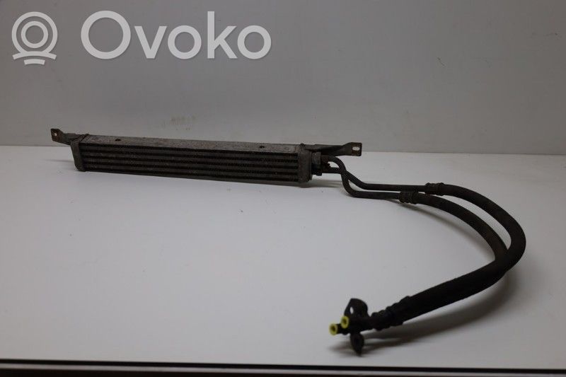 Saab 9-5 Moottoriöljyn jäähdytinlaite 