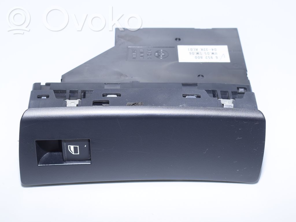 Electric window control switch   6952800