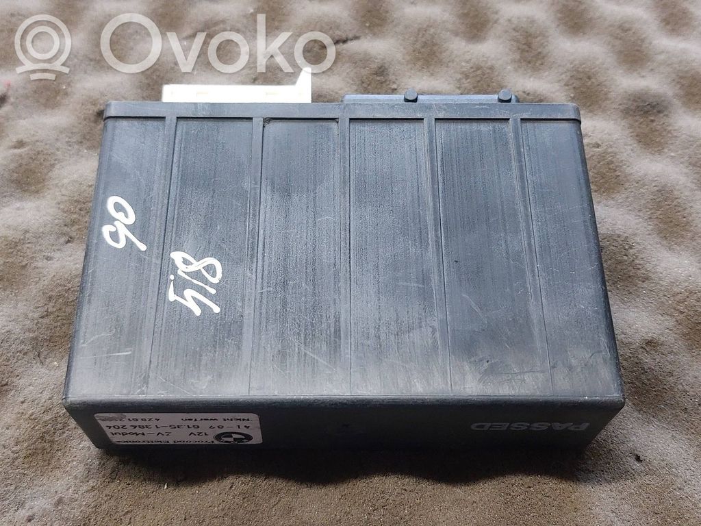 BMW 5 E34 Komforto modulis 