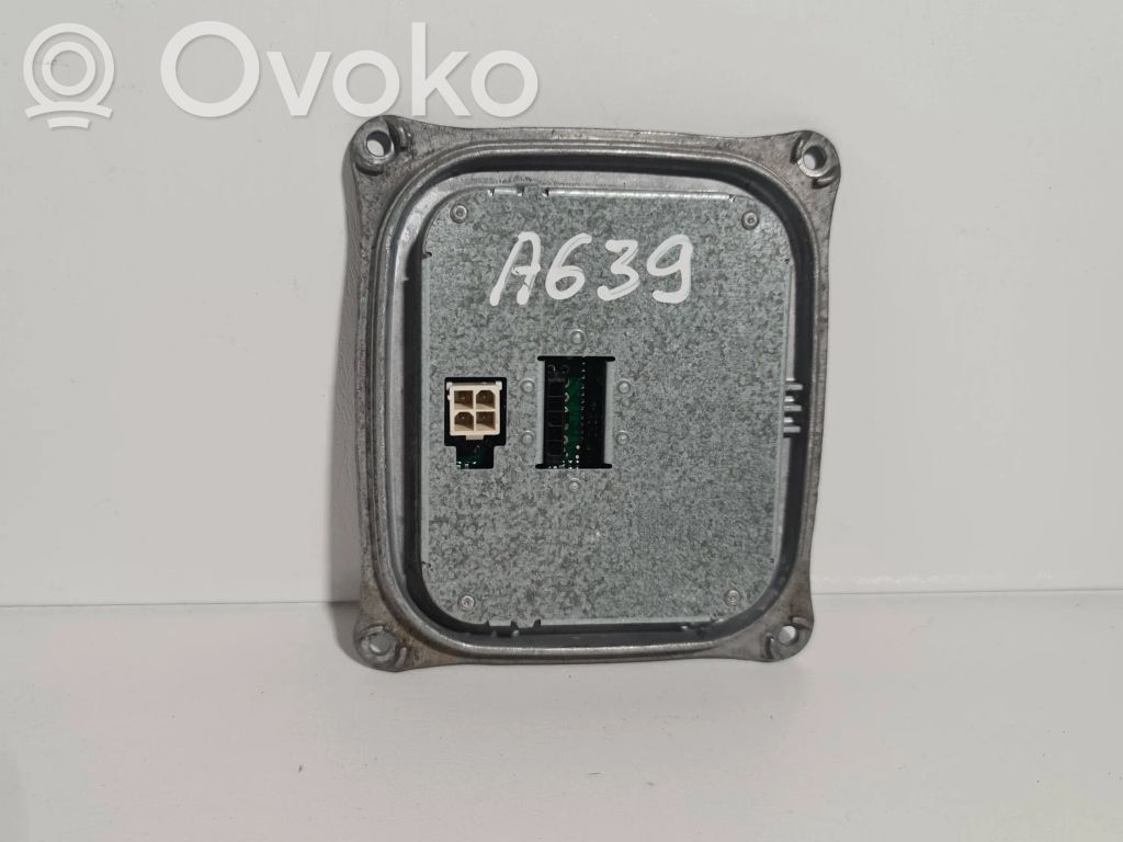 Opel Astra J Moduł poziomowanie świateł Xenon 