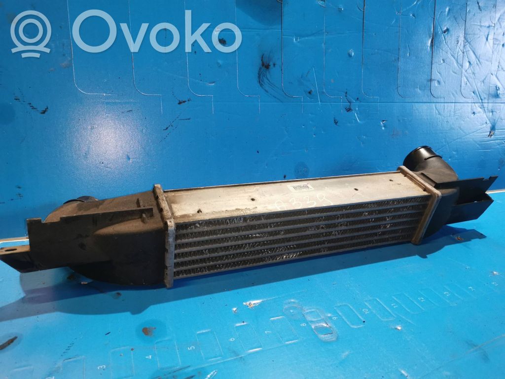 Chłodnica powietrza doładowującego / Intercooler   52482359,21JU01999