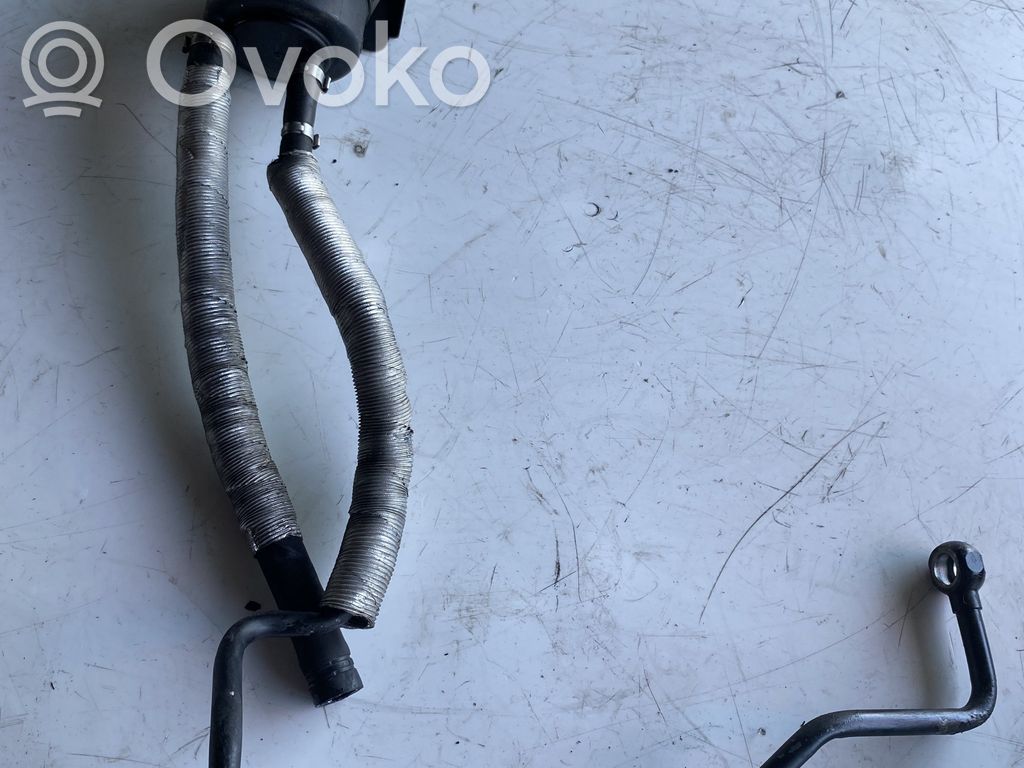 Ohjaustehostimen nestesäiliö   1097164