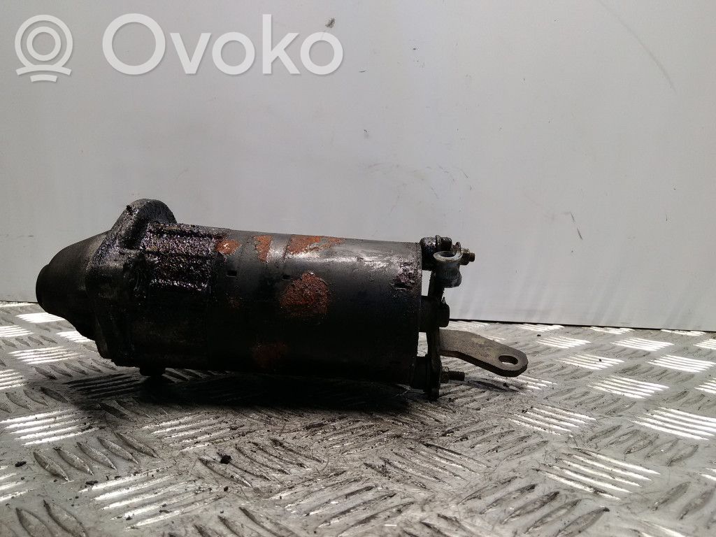 Motor de arranque   06B911023