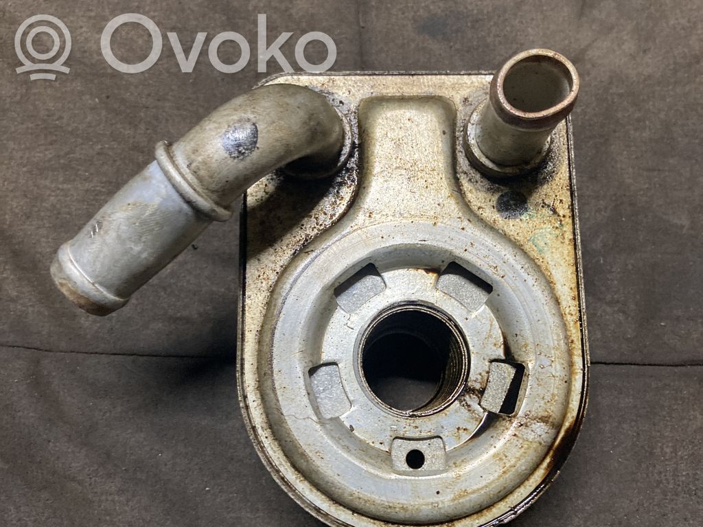 Oil filter mounting bracket   7S7G6B856GA