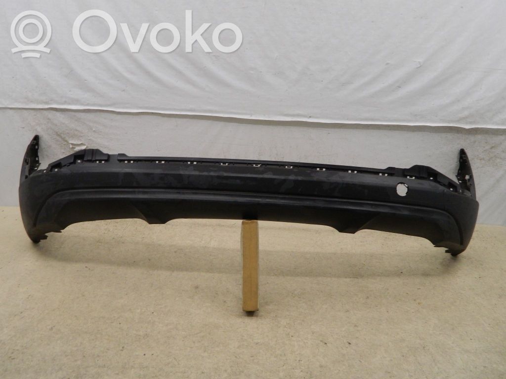 Volkswagen Golf VII Moldura inferior del parachoques trasero 