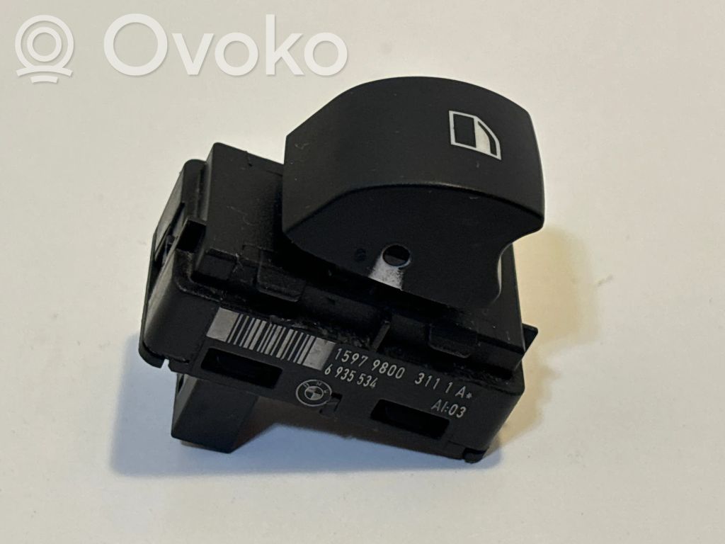 Electric window control switch   6935534,15979800