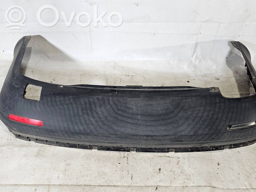 Volkswagen Jetta V Moldura inferior del parachoques trasero 