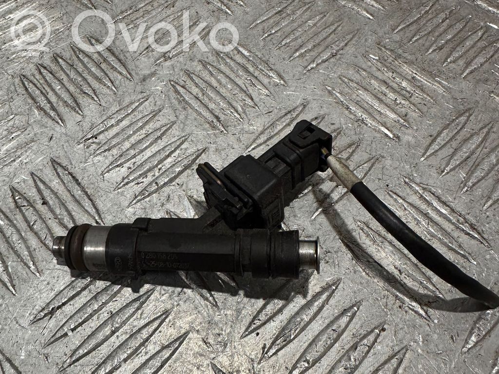 Opel Astra J Inyector de combustible 