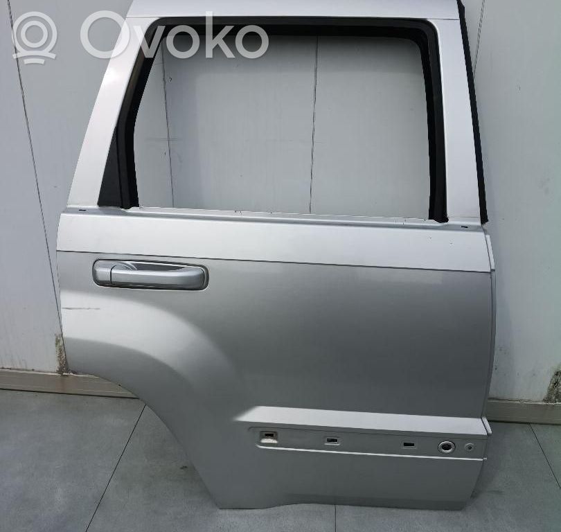 Jeep Grand Cherokee (WK) Galinės durys 