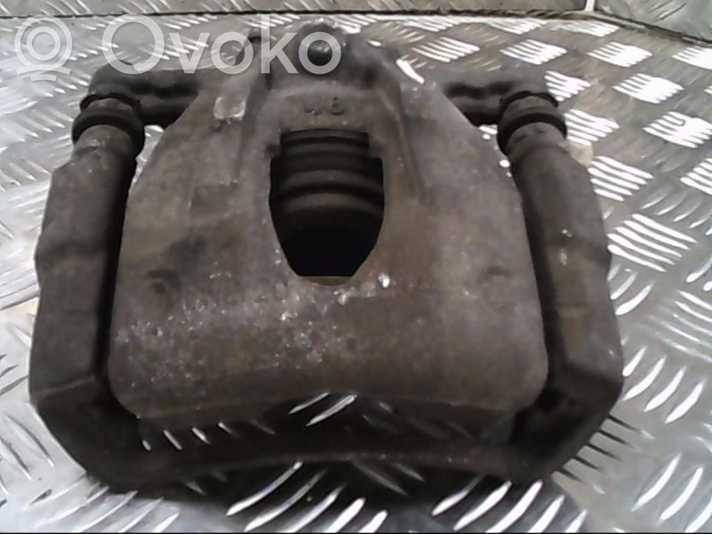 Opel Corsa C Zacisk hamulcowy przedni 