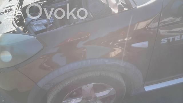Dacia Sandero Błotnik przedni 