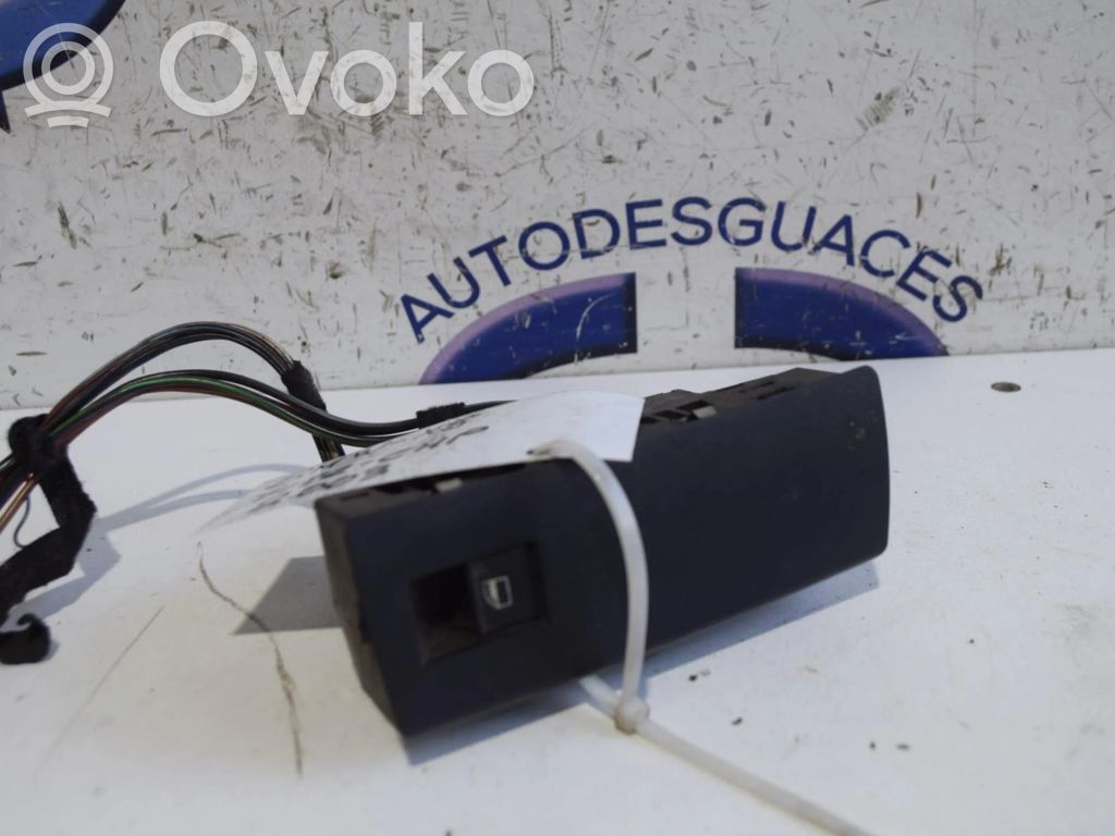 Electric window control switch   6937481