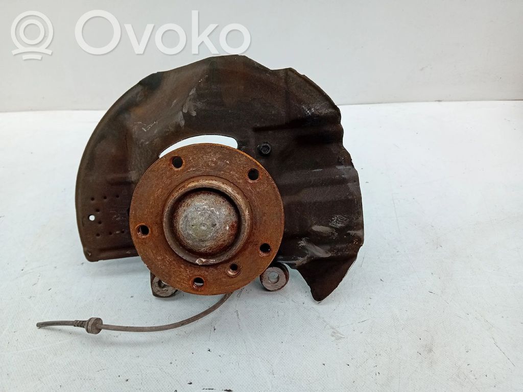 Front wheel hub spindle knuckle