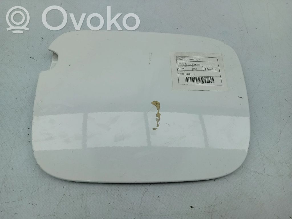 Klapka wlewu paliwa   9812083180